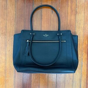 Kate Spade Elegant Black Tote with Tassel Accent